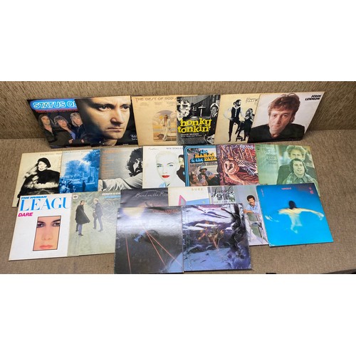 1245 - Selection of 20 vinyls including: Rod Stewart, Phil Collins and Status Quo.