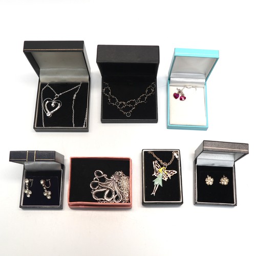 459 - Selection of 7 boxed white metal costume jewellery.