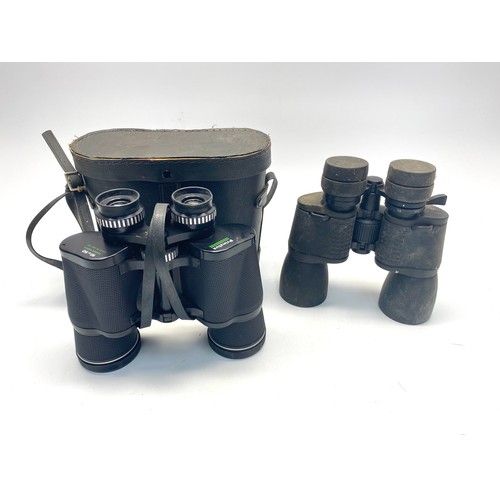 469 - Two set of binoculars including Prinzlux 10x50 coated optics.