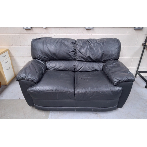 103 - Leather Two seater sofa in good condition