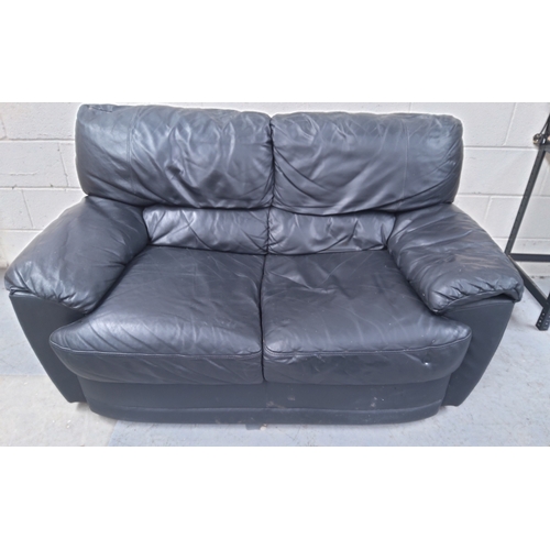 104 - Leather Two seater sofa in good condition