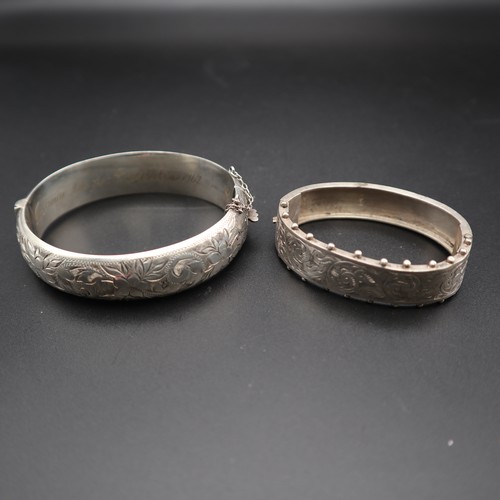 872 - Two sterling silver bangles 43g.