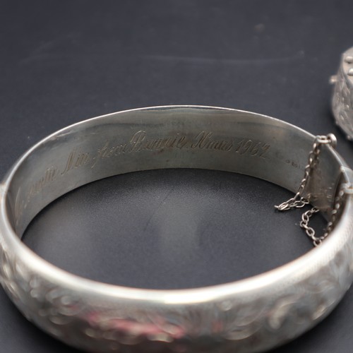 872 - Two sterling silver bangles 43g.