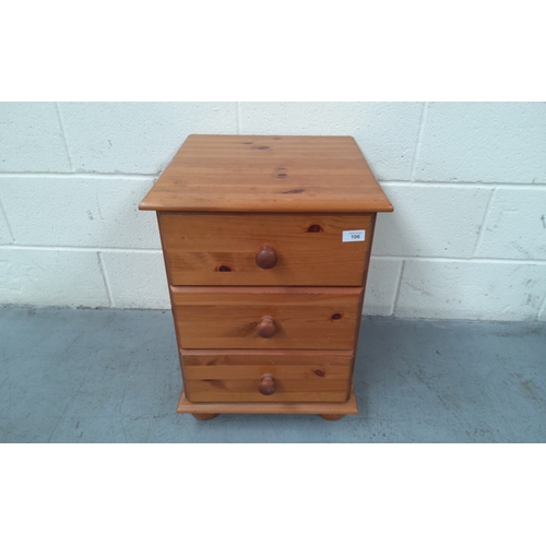 106 - Pine three drawer bedside table