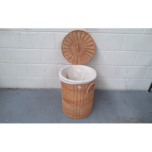 110 - Lovely wicker laundry basket with liner.