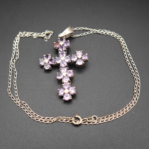 878 - Silver cross and chain.