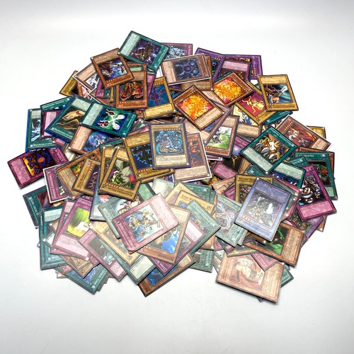 736 - Approximately 270 yu-gi-oh including an range of different rarity of cards. (mostly common)