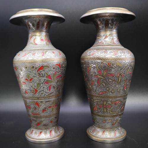 728 - Two vintage middle eastern brass vases with enamel and etched decoration. 18cm.