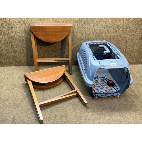 157 - 2 wooden fold away side tables and a plastic cat carrier.