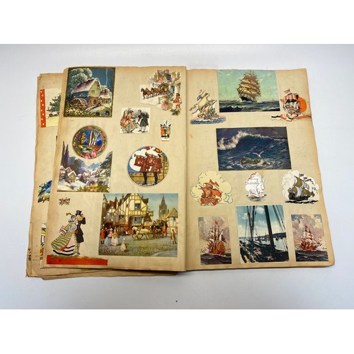 778 - vintage scrap book and a artist concept painting book filled with paintings.