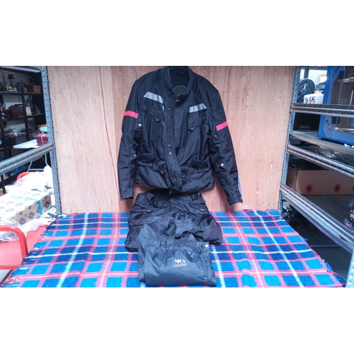 197 - Fabric Motorbike suit by Crane and waterproof trousers, size large jacket and medium trousers