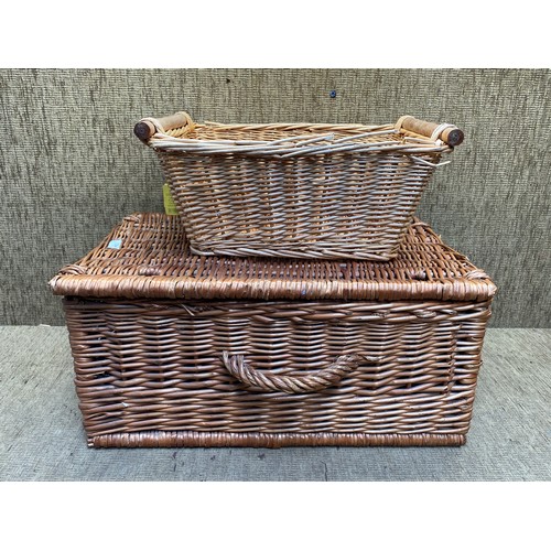 194 - 2 wicker baskets. Size: 64cm x 28cm.