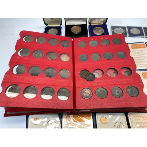 770 - Collection of commemorative coins and sets, including an early bronze coin collection.