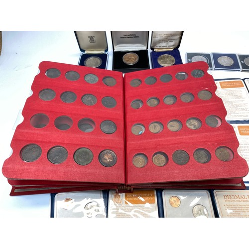 770 - Collection of commemorative coins and sets, including an early bronze coin collection.