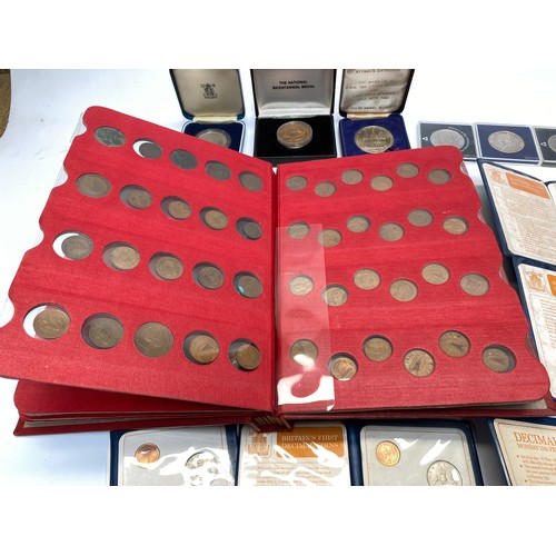 770 - Collection of commemorative coins and sets, including an early bronze coin collection.