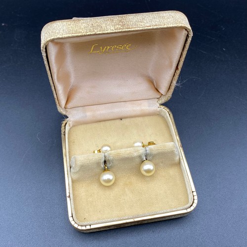 821 - Pair of 9ct gold pearl earrings.