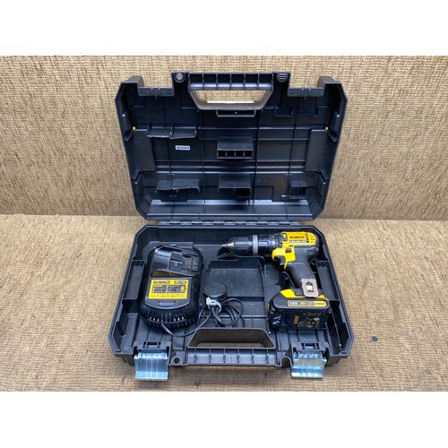 204 - Dewalt XR LI-ION Drill with charger and battery in good working order.