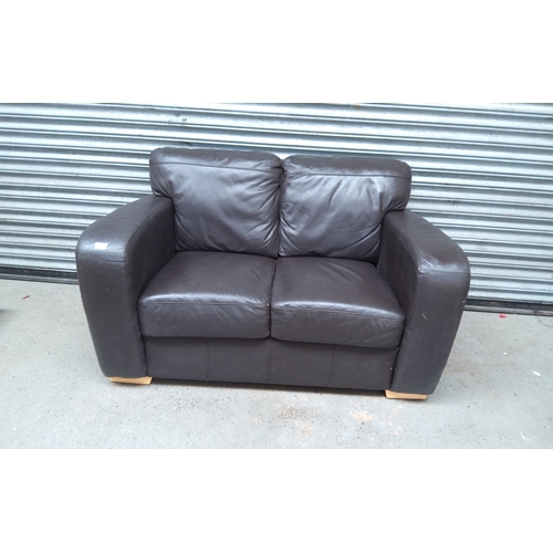 215 - Two seater brown leather sofa