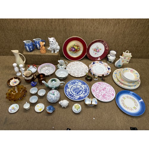 224 - A selection of mixed ceramics including plates and vases