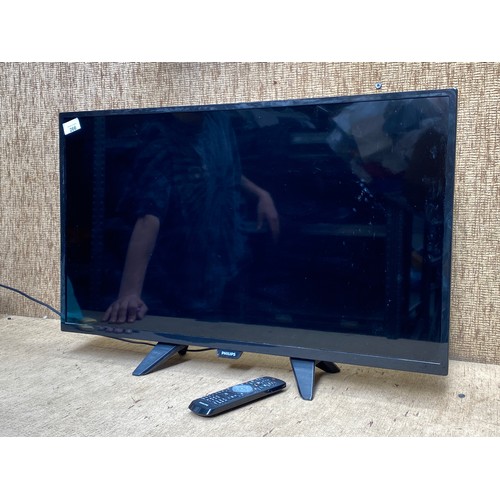 266 - Phillips 32 inch HD TV with remote.