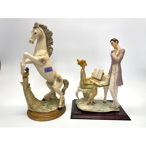 543 - 2 collectible resin figures including: Ligne.
Largest: 41cm.