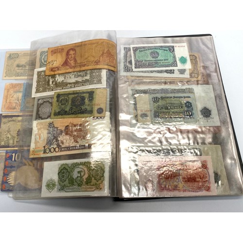 771A - Collection of approximately 110 bank notes in a folder.