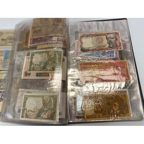 771A - Collection of approximately 110 bank notes in a folder.