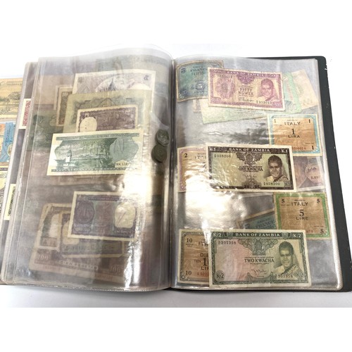 771A - Collection of approximately 110 bank notes in a folder.