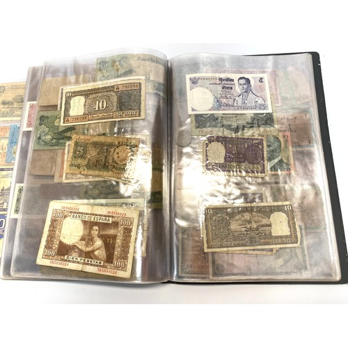 771A - Collection of approximately 110 bank notes in a folder.