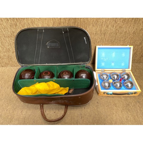 564 - Boxed French boule set and a leather Slazenger bag with hylite super grip bowls set.