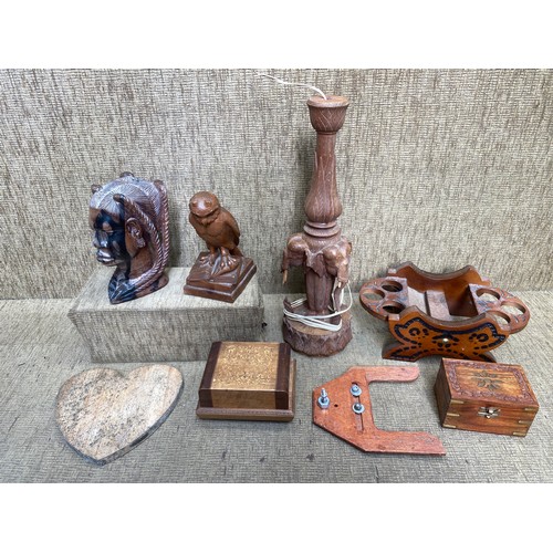 291 - Mixed treen items including: musical trinket/cigarette boxes and a carved elephant lamp.