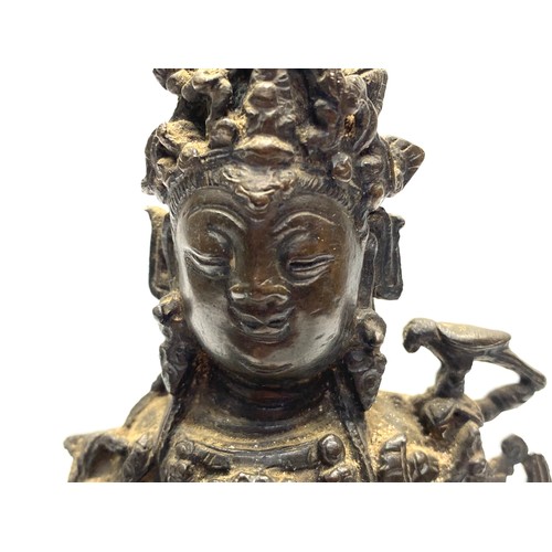 858 - Early Chinese Bronze figure of a Bodhisattva Manjushri sitting on a lion. 23cm tall. Possibly Tibet ... 