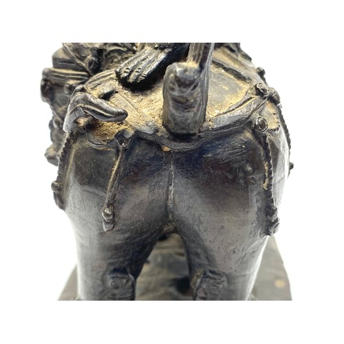 858 - Early Chinese Bronze figure of a Bodhisattva Manjushri sitting on a lion. 23cm tall. Possibly Tibet ... 