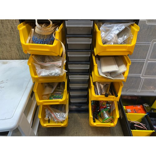 311 - 4 plastic storage containers with large quantity of computer repair equipment.