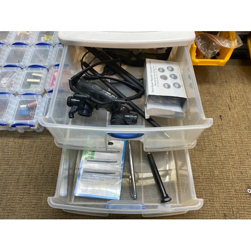 311 - 4 plastic storage containers with large quantity of computer repair equipment.