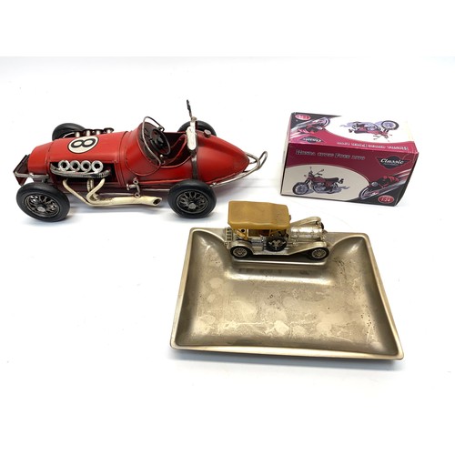 570 - 3 collectible cars and motorbike ornaments.