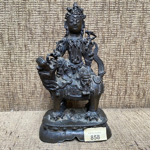 858 - Early Chinese Bronze figure of a Bodhisattva Manjushri sitting on a lion. 23cm tall. Possibly Tibet ... 