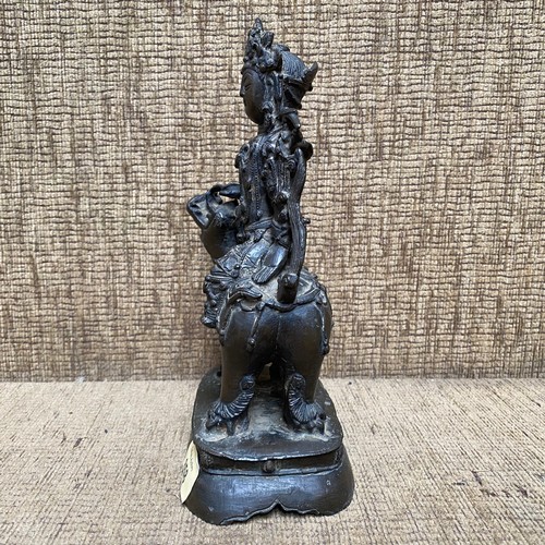 858 - Early Chinese Bronze figure of a Bodhisattva Manjushri sitting on a lion. 23cm tall. Possibly Tibet ... 