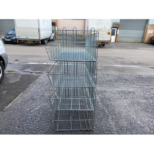 329 - Large Four tier metal storage rack. (stored across the road in the taxi office)