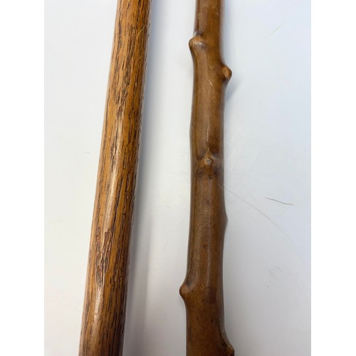 657 - 2 vintage walking canes with antler and bone handles with white metal rim fittings.