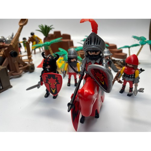 663 - collection of vintage playmobil figures including: castle furniture, Mordred dragon unit and English... 