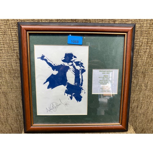 1068 - Michael Jackson framed signed picture with certificated of authenticity on rear.