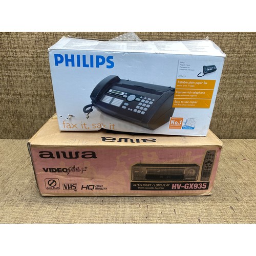 58 - Philips FAX machine and aiwa VHS player.