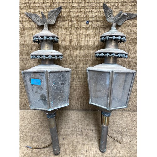 1076 - A pair of vintage empire eagle lanterns with electrical light fitting.