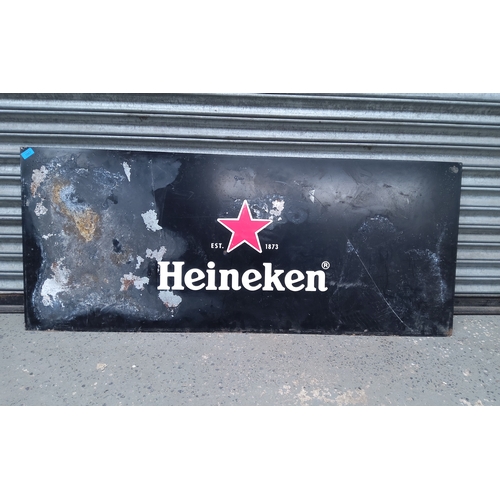 1087 - Large metal Heineken sign measuring 150cm x 62cm