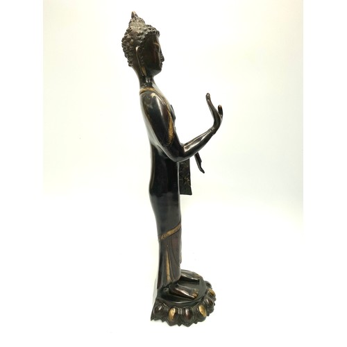 704 - Large brass ornate sculpture of a Tibetan Buddha. (possibly 1900s). Height: 54cm.