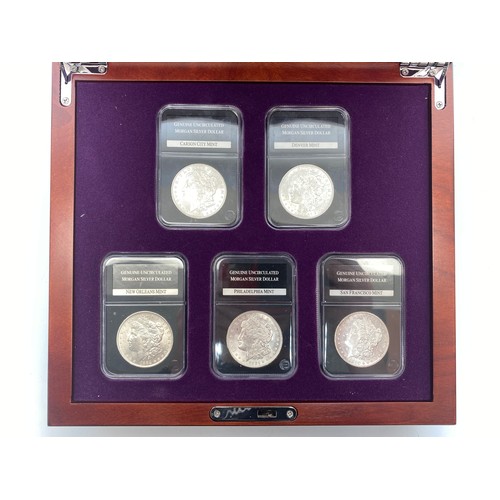 859 - Danbury mint. The Complete Uncirculated U.S. Morgan Silver Dollar Mint Collection. Slabbed with bar ... 