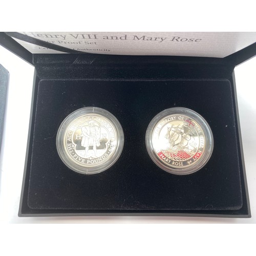 860 - The Royal mint 2009 Henry the VII and Mary Rose silver proof set, two £5 coins with heritage to the ... 