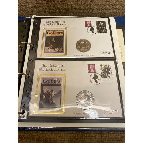 855 - Royal Family album containing collectible coins and first day covers.