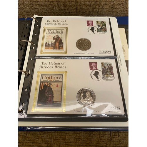 855 - Royal Family album containing collectible coins and first day covers.